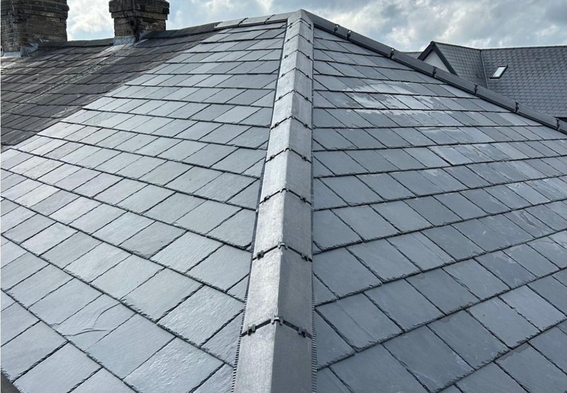 A grey repaired roof.